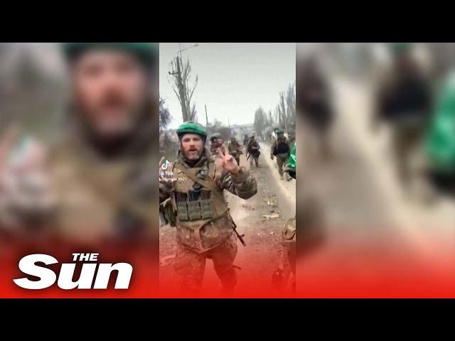 Ukrainian soldiers seen walking in the streets of Bakhmut