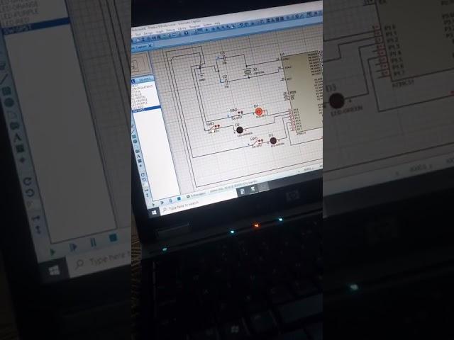 LEDs controlling through at89c51 microcontroller with switches| Keil and proteus| Traffic light