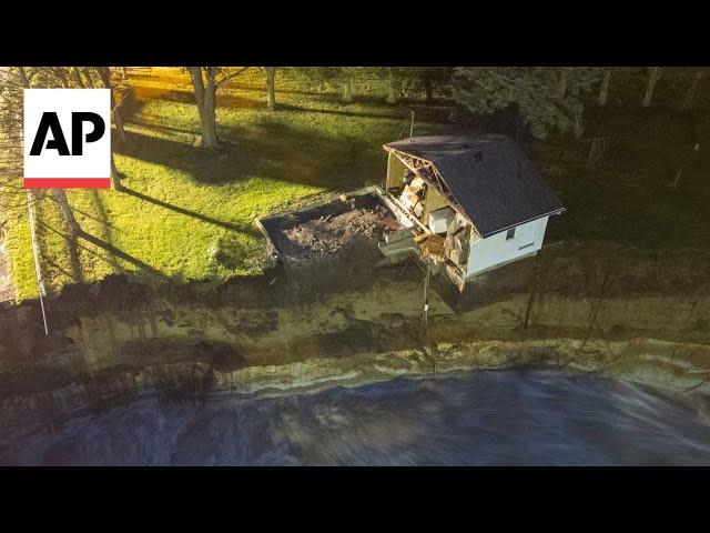 WATCH: Video captures house collapsing into water next to Minnesota dam