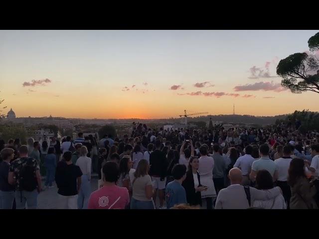 People singing Felicità from Al Bano and Romina Power at terrazza del Pincio Sunset Rome