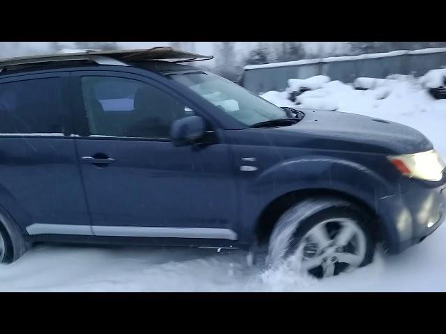 Mitsubishi Outlander XL 3.0 and russian winter ... snow