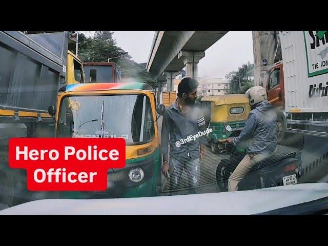 On duty police teach a lesson to an auto driver