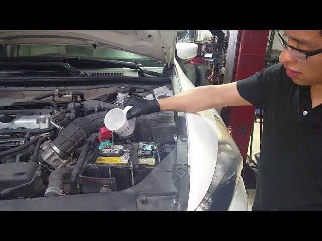 Pouring water and baking soda on a really bad leaky battery. How to neutralize battery acid