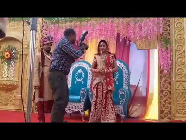 Hilarious video..! Groom beating the photographer for getting too close to the bride