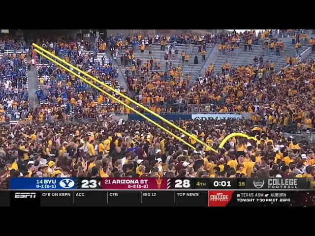 Arizona State fans storm the field before the game is over and take goalposts down vs BYU