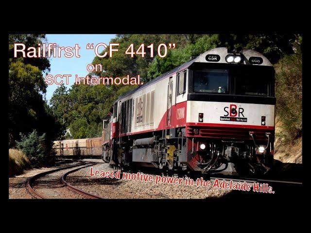 SCT Intermodal with "Railfirst"  CF4410 locomotive.