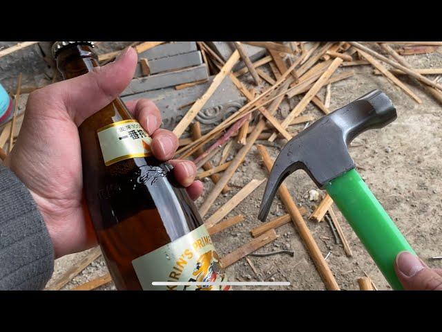 How to open a beer bottle with a Hammer 