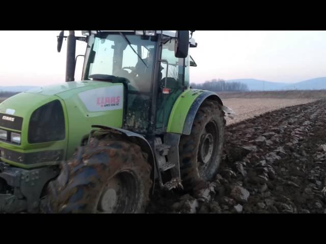 Claas Ares 836 + Vogel Noot XMS - Ploughing / Oranje