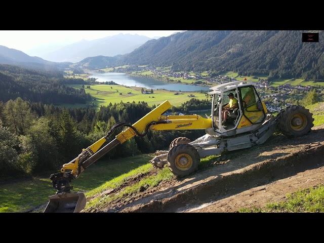 Menzi Muck M545x 》 Arbeiten im Steilhang 》 wo andere Urlaub machen 》 Weißensee