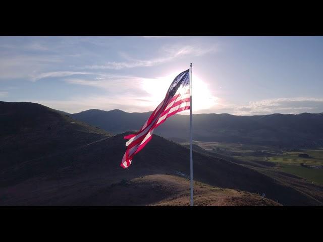 OLD GLORY: Royalty-free CC drone footage of the American Flag at sunset (4K, 24fps, download link)