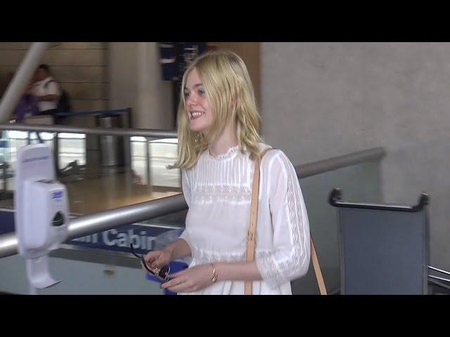 Elle Fanning Goes Braless Through LAX