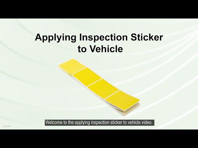 Applying Inspection Sticker to Vehicle