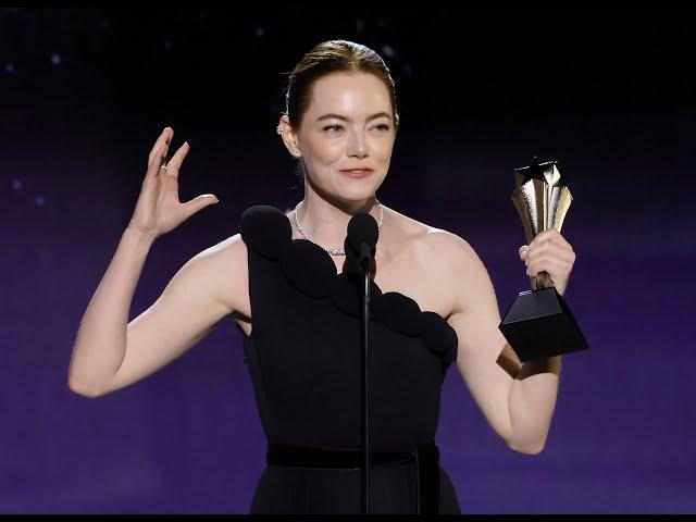 Emma Stone wins the "Best Actress" award at the 29th annual Critics Choice Awards.