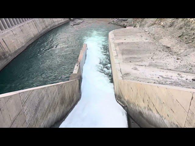 Managing Dam Gate Overflow Discharge