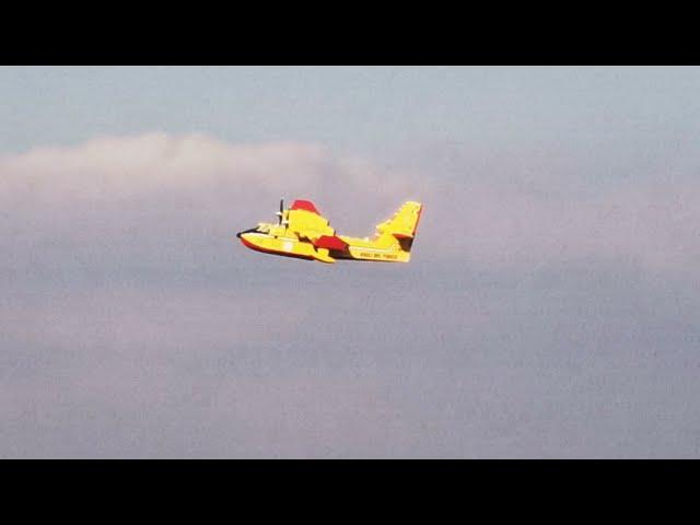 Canadair CL-415, Registration I-DPCH and I-DPCI at Vienna "New Danube" taking a drink.