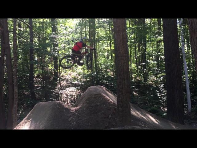 Collin Bourque riding Lower Sherwood big line at Highland Mountain Bike Park