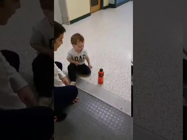 2 year old lands a Bottle Flip!!