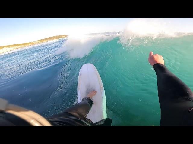 Surfing a MINI SIMMONS and MID LENGTH