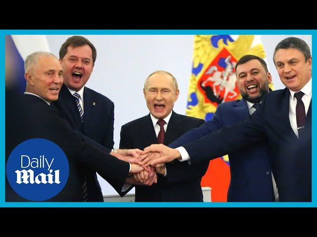 Putin holds hands with Russia-backed leaders chanting 'Russia, Russia, Russia!'