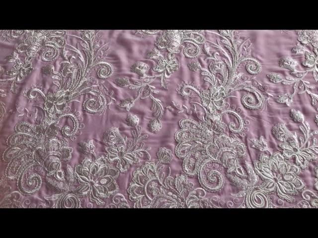 An ivory lace fabric from Bridal Fabrics, that we call Passion