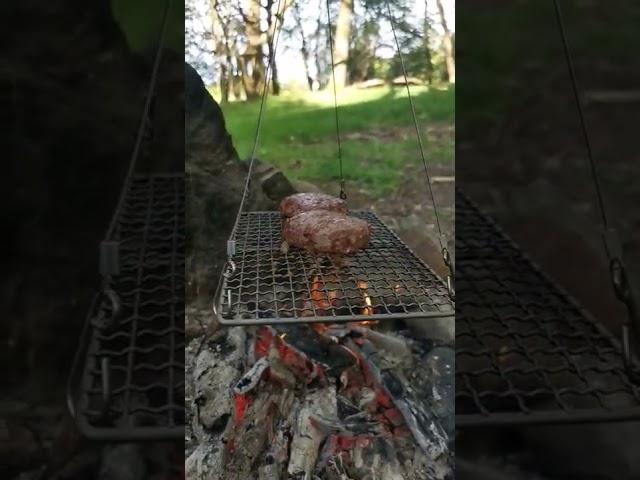 Cooking burgers in the woods