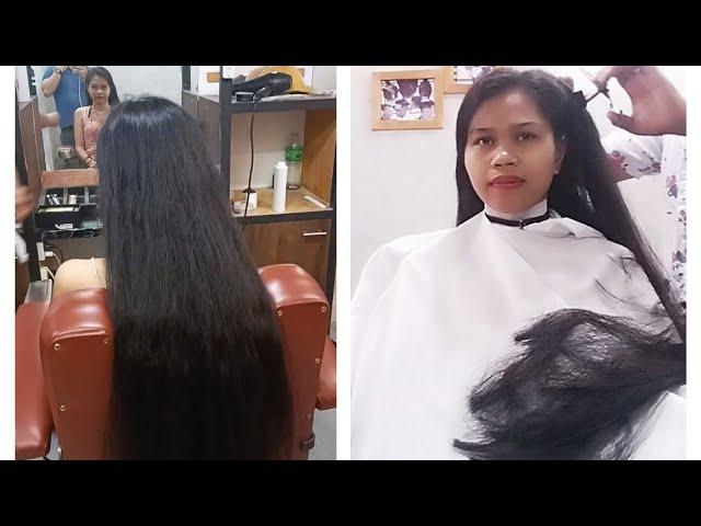 Crazy or genius? Long haired girl at the barber shop