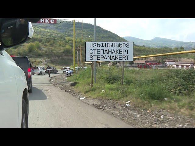 Journalists enter Stepanakert in Nagorno-Karabakh with Azerbaijani officials | AFP