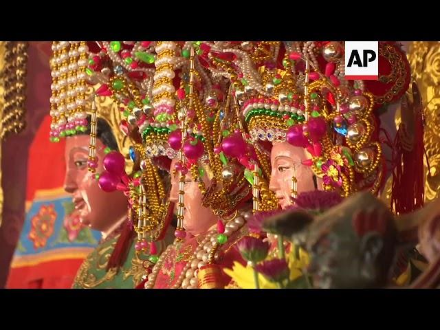 Thousands take part in Hong Kong's Cheung Chau Bun festival