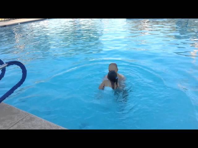 Daniella swimming with daddy (3 years old)