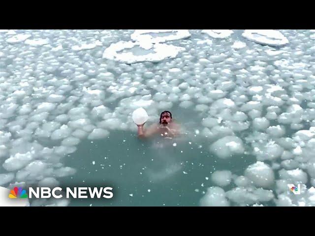 Chicago man takes cold plunge in Lake Michigan during deep freeze