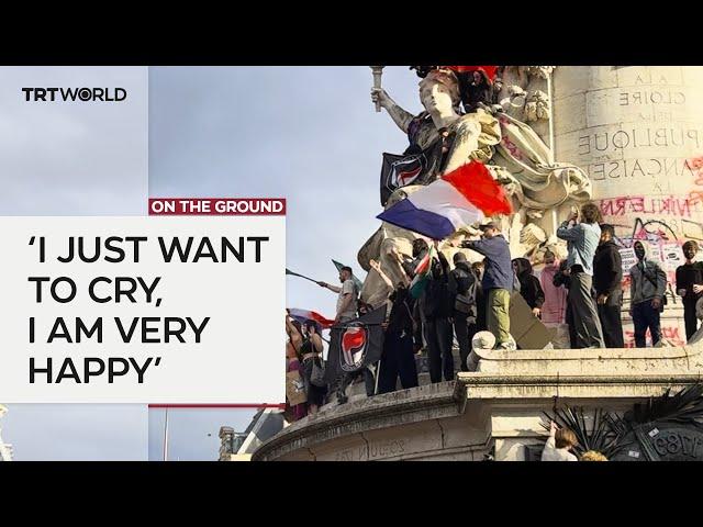 French youth celebrate initial estimates of legislative election results