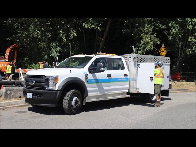 Custom Municipal Utility Water Works Truck At Work