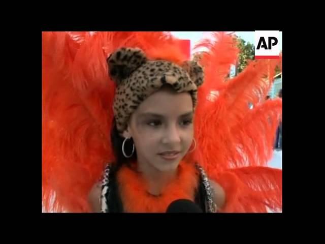 Children parade down the samba avenue as Carnival starts