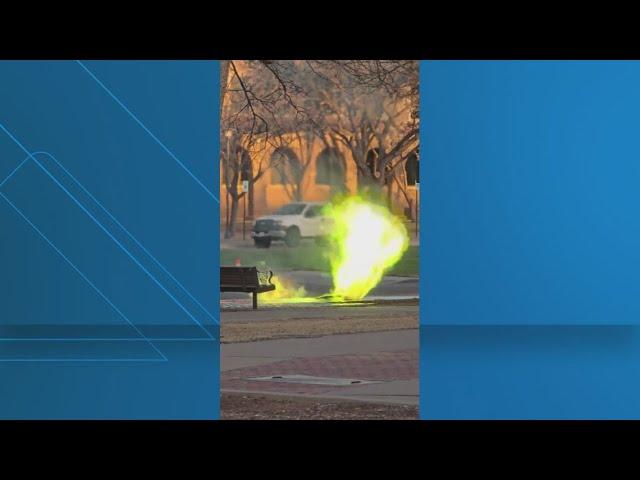 Explosion at substation causes green and yellow flames to burst out of man  hole at Texas Tech