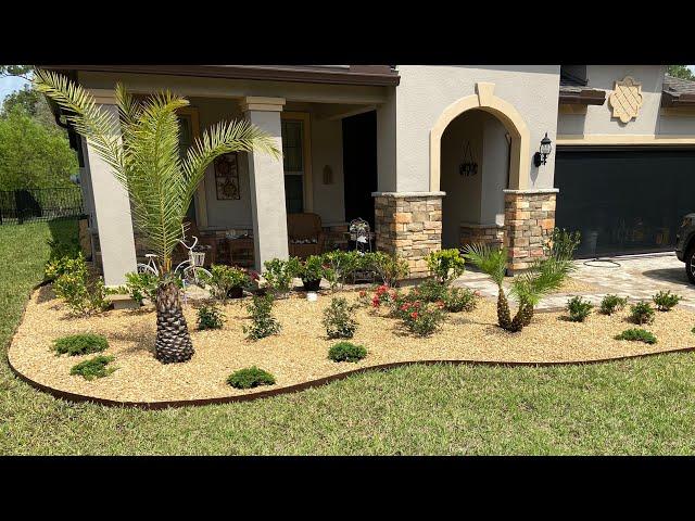 Installing Brown river rock & @Colmet  landscape edging in NORTH FLORIDA