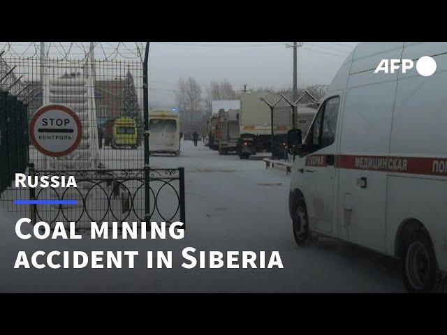 Emergency services on site of fatal Siberian coal mine accident | AFP