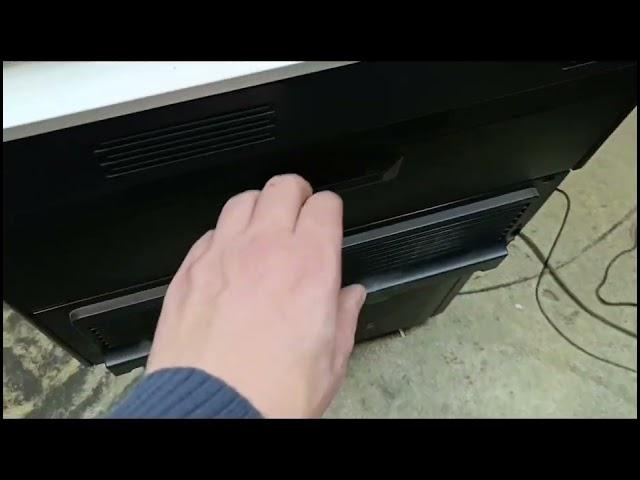 Replacing the waste toner container on HP 700 MFP.