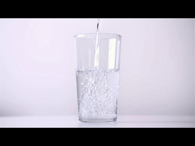 Pouring Water Into A Glass