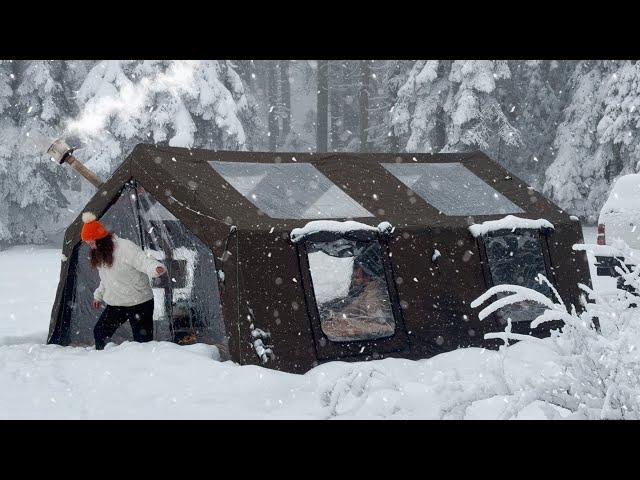 LUXURY TENT CAMP IN A SNOW-COVERED DESERTED FOREST