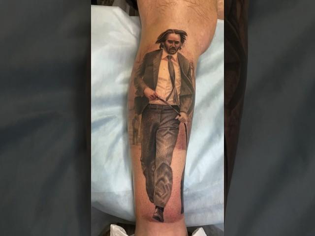 John wick tattoo by tattoo artist Oleg Romanov