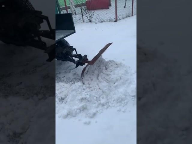 adapter for a walk-behind tractor, with a blade, on an electric drive...