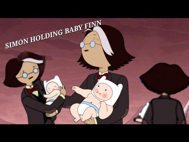 Simon holding baby Finn MOMENTS 