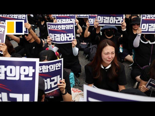 Teacher suicide sparks protests against parent bullies in South Korea