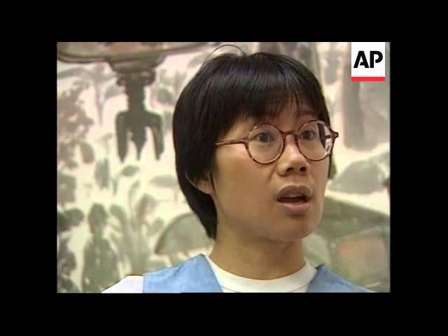 HONG KONG: CHIEF EXECUTIVE FALLS OFF PODIUM DURING VOTER CAMPAIGN