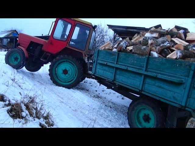 As Vladimirets T-25A went to the mountain with a laden trailer.