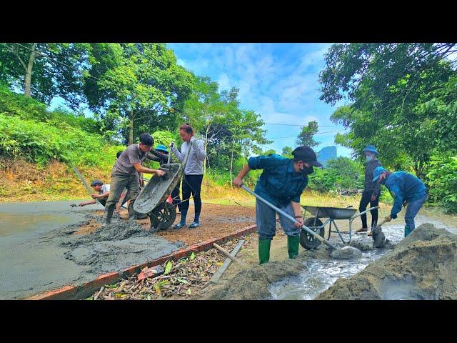 Authorities and villagers join hands to help KONG build a solid foundation for his new house.