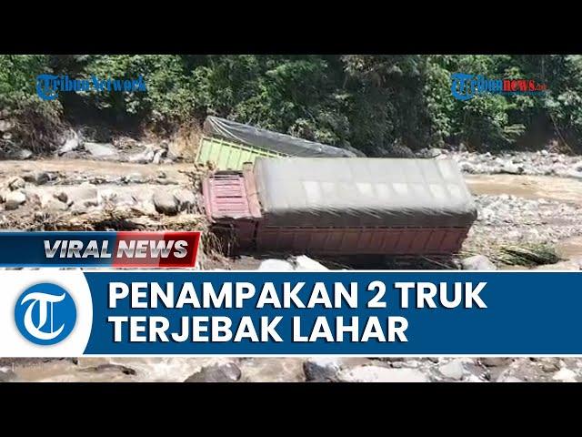 Penampakan Dua Truk Terjebak di Tengah Sungai Lembah Anai Akibat Terseret Banjir Lahar Dingin Sumbar