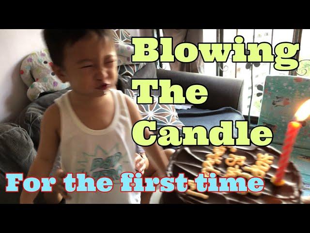 Blowing the candle for the first time