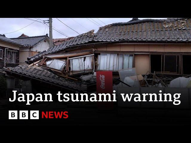 Japan downgrades major tsunami warning after earthquakes - BBC News