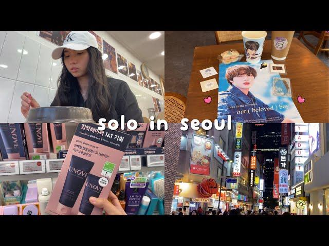 [korea vlog] solo traveling! myeongdong, olive young, bts jin cafe event, what i eat, shopping, etc